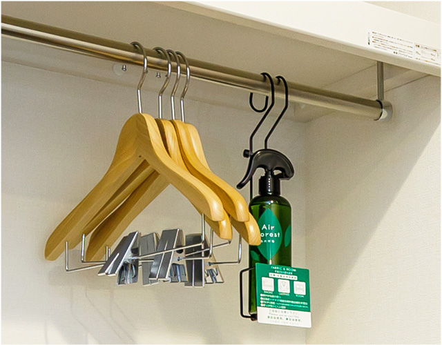 Hangers and deodorant spray